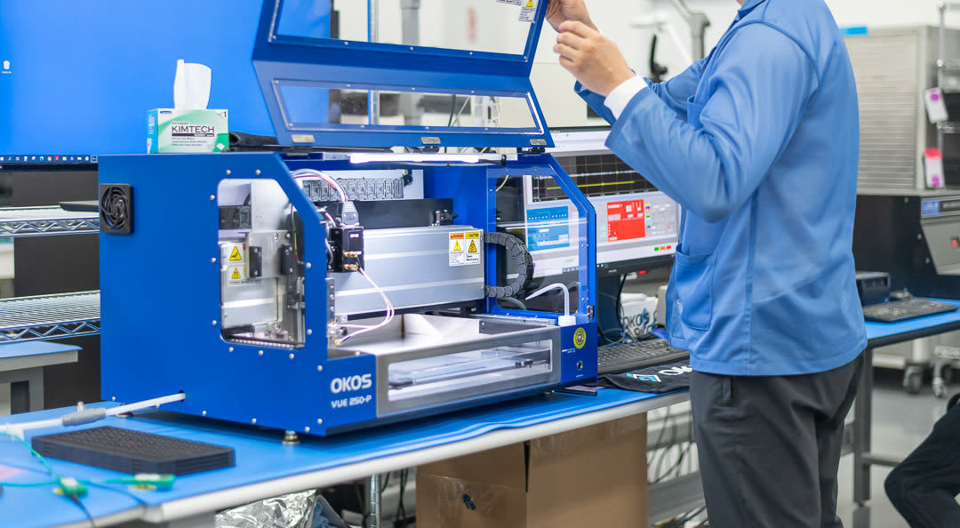 person working on high-tech equipment